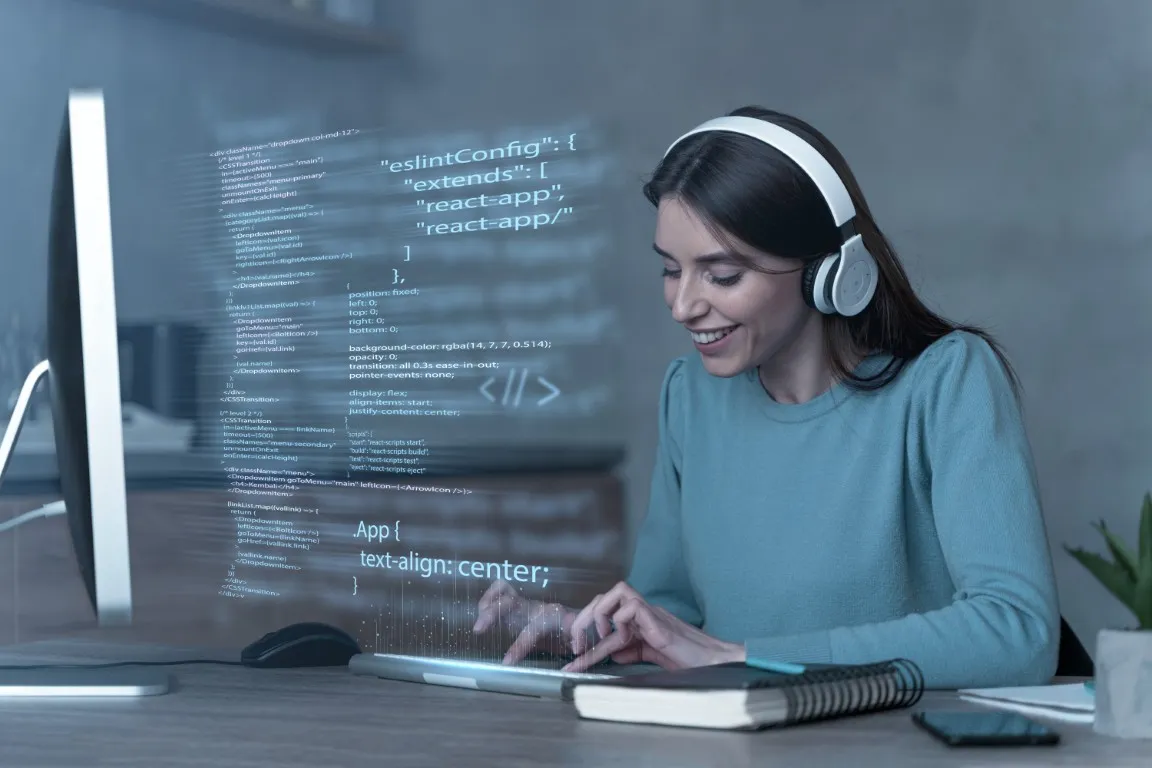 wypalenie zawodowe programisty – wyczerpana deweloperka przed laptopem